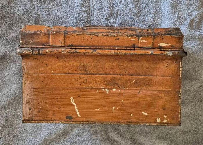 Small vintage metal trunk.