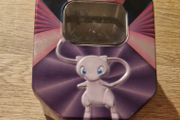 Pokemon Tin and 60 Pokemon cards