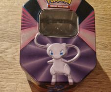 Pokemon Tin and 60 Pokemon cards