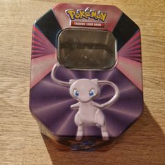Pokemon Tin and 60 Pokemon cards