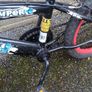 Children's black and red ninja bike Image 4