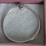 Pandora Moments encircled clasp bangle openwork swirl clasp holding a sparkling center crystal in great condition Image 2