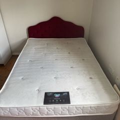 Double bed with mattress and headboard