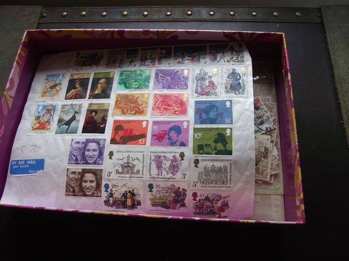 A box with collection of stamps from Great Britain