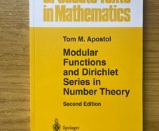 Modular Functions and Dirichlet Series in Number Theory