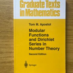 Modular Functions and Dirichlet Series in Number Theory