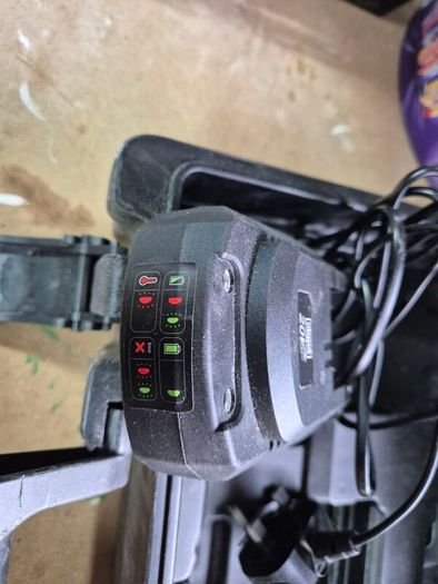 brand new cordless drill with 2 batteries, a charger, and carry case.