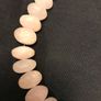 Pink stone, gold-coloured disc necklace Image 3