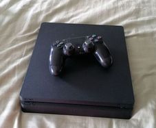 playstation 4 slim 500gb in great condition with racing wheel Apex