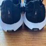 Nike Air Zoom Alphafly NEXT% 2 marathon racing shoes in black and white. Image 2
