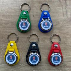 Brand new synthetic leather Saab key ring with shopping trolley token/coin