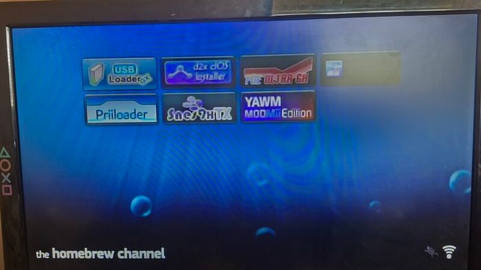 Modded Nintendo Wii with games 64GB SD