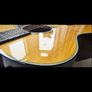 Taylor 618e  Grand Orchestra Spruce with Flamed Maple. Image 8