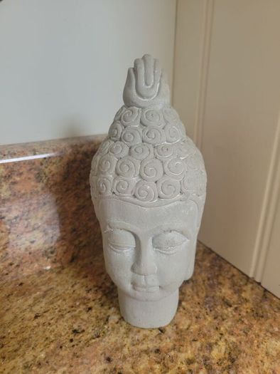 small concrete buddah decor piece