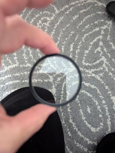 genuine Hoya 58 mm UV filter.  no scratches.