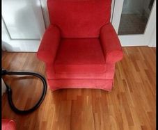 red single sofa with wheels