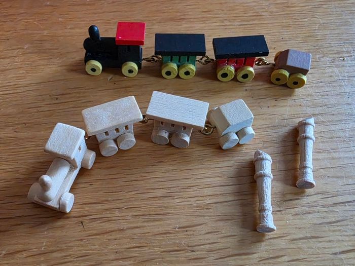 Wooden toys for dolls house nursery