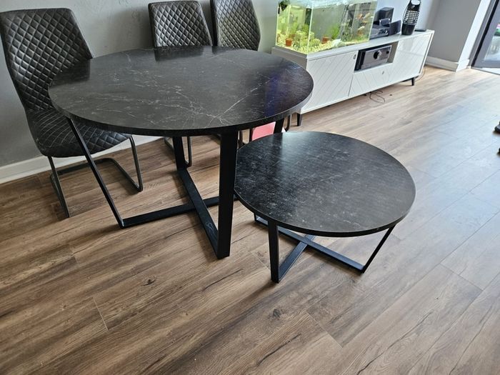 Round dining table with a matching coffee table