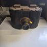The object in the image is a vintage antique camera Image 3