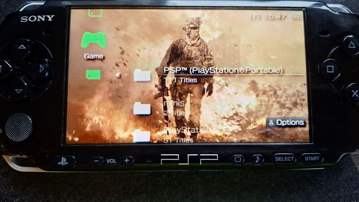 Modded Black PSP Slim 3000 128GB with games