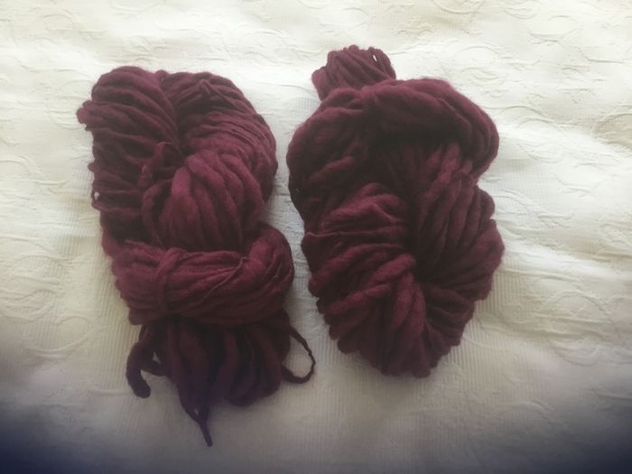 2 hanks of yarn dark red wine