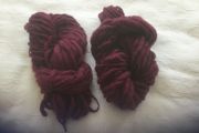 2 hanks of yarn dark red wine