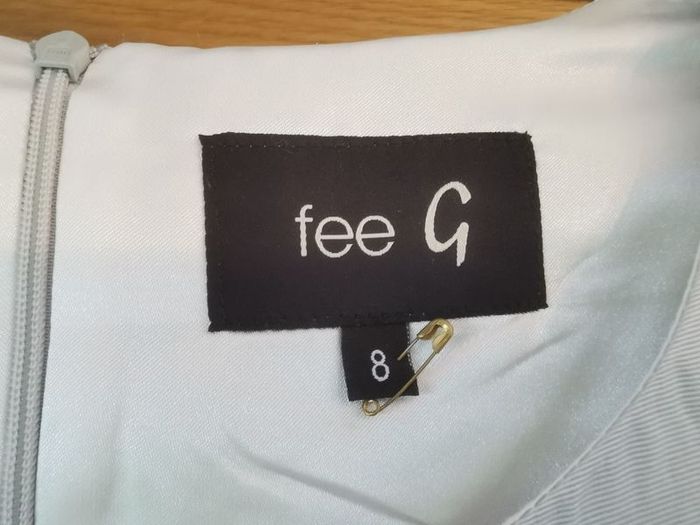 Fee G Dress with fascinator