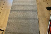 Grey new  carpet 13 feet x 2.7
