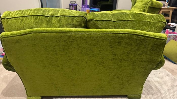 2-seater green velvet sofa