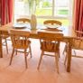 Solid pine dining table and chairs Image 2