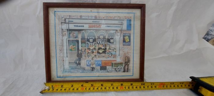 Old advertising shop front picture print ,different brands for sale, in the shop,nice for any home bar or man cave pub restaurant etc,,buyer collects thank you,, rather buyer collects with the glass ,sold as is ,,see pictures for condition