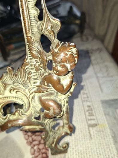 Beautiful Pair of Antique Art Nouveau Beatrice. Bronzed Photo Frames Cherub. a stunning lady lies on the top of the frame with beautiful scrollwork descending down the frame to a winged Cupid or Angel