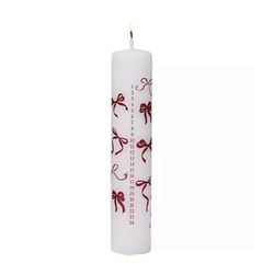 New White Advent candle with red bows