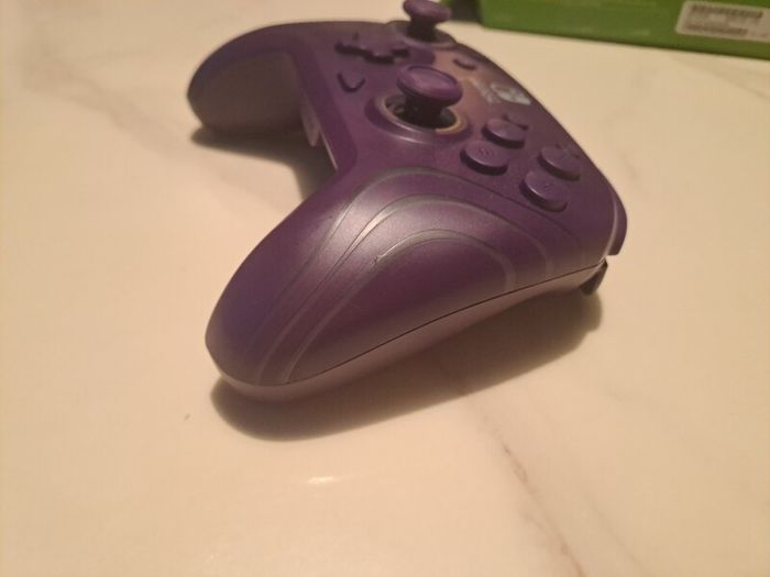 Nintendo Switch PDP Afterglow Wave Purple controller