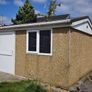 Deluxe 14ft x 12ft Modular Concrete Building Shed with brindle pebble dash finish. Image 9
