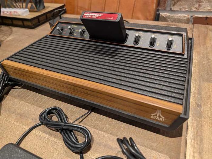 Immaculate Atari 2600 with Two joysticks and Two paddles and Centipede game