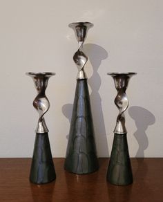 Trio of chrome twist & enamel painted candlesticks