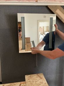 Bathroom mirror with integrated lights