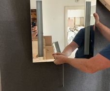 Bathroom mirror with integrated lights