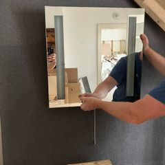 Bathroom mirror with integrated lights