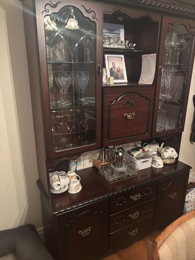 Dark wood antique china cabinet