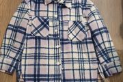This is a blue-violet and cream checkered ONLY shirt jacket (commonly known as a shacket) with pockets.