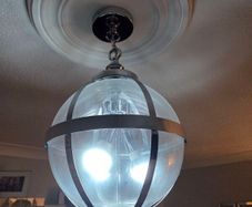 Glass chrome globe light fitting