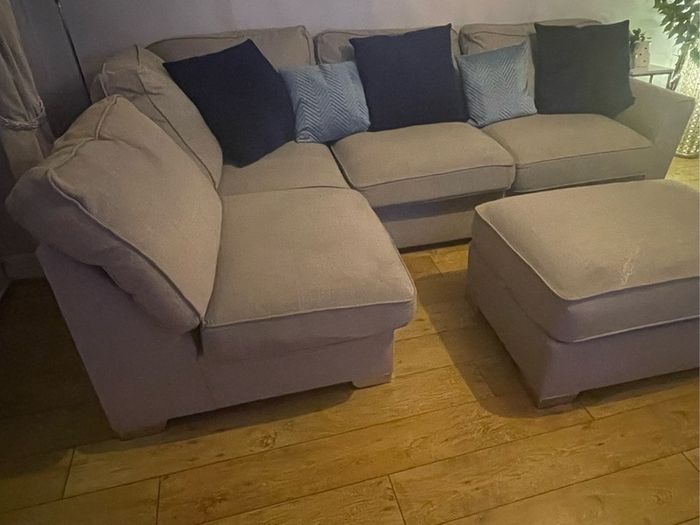 Large grey L shaped sofa & matching footstool