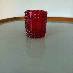Red glass candle holder