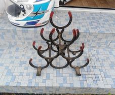 Old horse shoe wine rack