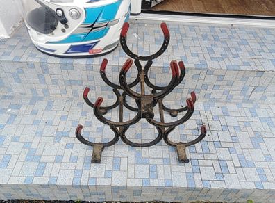 Old horse shoe wine rack