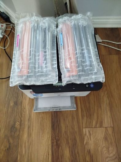 Samsung Xpress colour laser printer and scanner selling with  2 colour toner cartridges