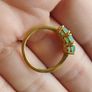 A trilogy ring for women with emeralds and 925 sterling silver in gold plated,TJC.. Image 6