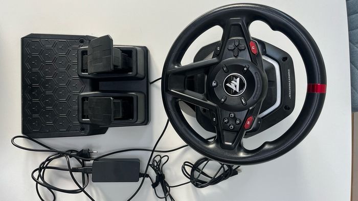 Thrustmaster T128 Racing Wheel + Magnetic Pedals (PS4/PS5/PC), Excellent Condition